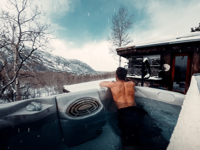 person swimming in the hot tub