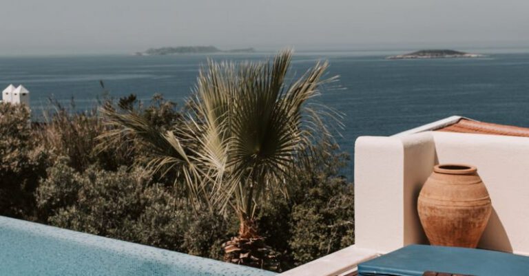 Pool Area - A Scenic View Of The Sea From Poolside